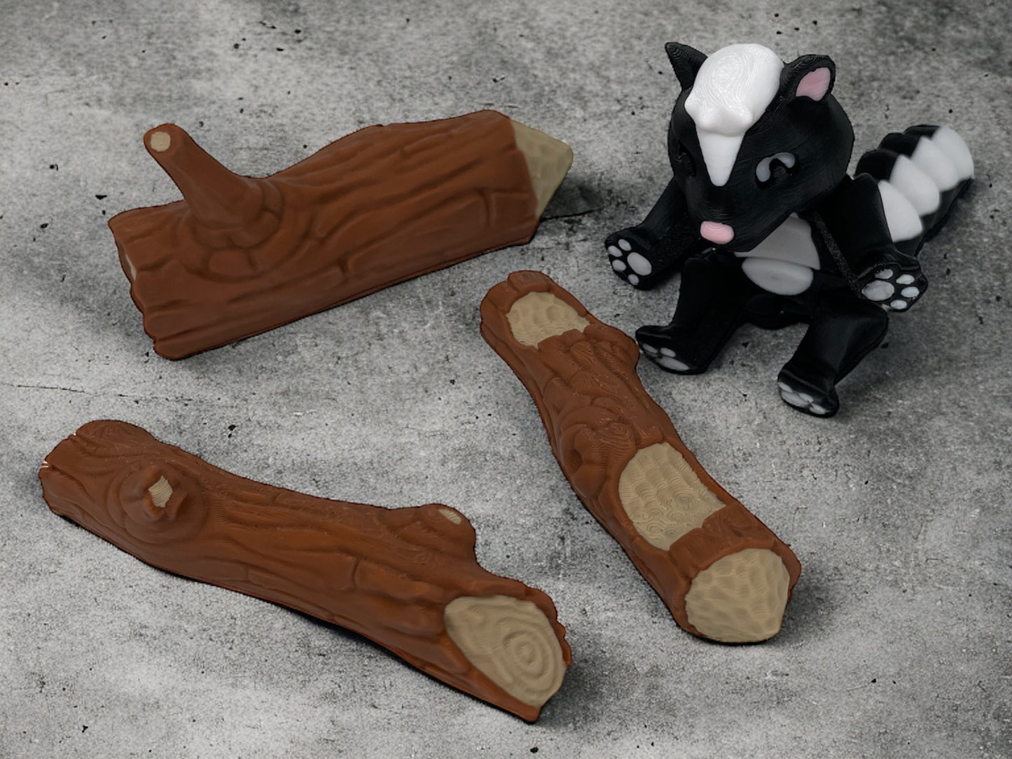 3D Druck Stinktier auf Baumstämmen